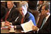 President George W. Bush discusses the creation of the Department of Homeland Security with members of Congress in a meeting in the Cabinet Room July 16, 2002. 