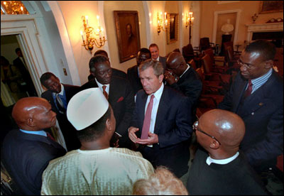 President George W. Bush talks with African leaders following his meeting with African presidents in the Cabinet Room, June 28, 2001. 