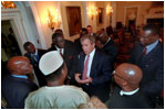 President George W. Bush talks with African leaders following his meeting with African presidents in the Cabinet Room, Thursday, June 28, 2001. 