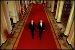 President George W. Bush and Russian President Vladimir Putin walk out to address the media at the White House on Nov. 13, 2001. "This is a new day in the long history of Russian-American relations, a day of progress and a day of hope," said President Bush in his remarks.