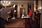 Laura Bush poses in the Map Room for a Family Circle article featuring the White House’s 2001 holiday decorations Sept. 10, 2001. 