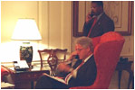 President William Clinton makes a phone call from the historic Map Room. The Map Room was created during World War II as Franklin Roosevelt’s War Room. 