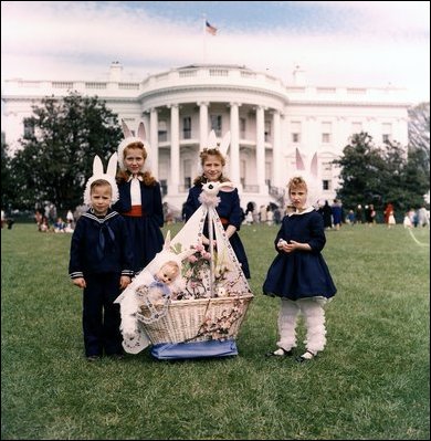 Children dressed in bunny ears pose at the 1961 annual White House Easter Egg Roll.