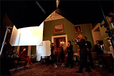 With the Green Room’s silk walls in the background, photographer Annie Liebowitz takes Laura Bush’s photograph March 20, 2001. In the 1890s, another notable woman photographer, Frances Benjamin Johnston, took photos of the White House interior.