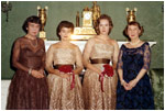 Mamie Eisenhower poses with her sister and two nieces in the Green Room for their debut party November 25, 1960.