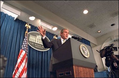 President George W. Bush addresses the media during a press conference in the James S. Brady Press Briefing Room March 13, 2002. 