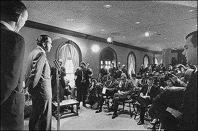 President Richard Nixon talks with reporters in the new Press Briefing Room April 17, 1970. The room was built over the site of Franklin Roosevelt's swimming pool.