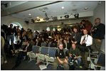 Reporters prepare for a press conference by President Bush in the James S. Brady Press Briefing Room, March 13, 2002. 
