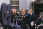 President Lyndon Johnson and General William Westmoreland speak to reporters in the "stake out" area outside the West Wing April 7, 1968.