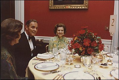 Betty Ford sits next to General Alexander Haig, a future Secretary of State (1981-82), in the Red Room during a dinner held in General Haig's honor October 23, 1974. 