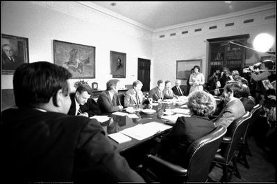 President Jimmy Carter meets with members of his Economic Policy Group in the Roosevelt Room March 28, 1977. Named the Fish Room during Franklin Roosevelt's administration, this rectangular conference room originally displayed the president's fishing mementos.