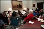 Barbara Bush talks with families of the Iraqi hostages in the Roosevelt Room December 13, 1990.