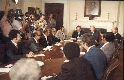 President Ford meets with Middle-Eastern Ambassadors in the Roosevelt Room August 9, 1974 shortly after his inauguration as the 38th President of the United States. Ford's predecessor, Richard Nixon, gave the room its name in 1969 to honor Theodore Roosevelt for constructing the West Wing and Franklin Roosevelt for expanding it. 