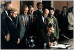 President Reagan signs the proclamation for Afghanistan Day on March 20, 1987 in the Roosevelt Room, which houses the Nobel Peace Prize awarded to Teddy Roosevelt. 
