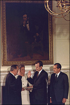 Appointed by then-President Richard Nixon, future President George H.W. Bush is sworn-in as U.S. Representative to the United Nations in the State Dining Room February 26, 1971.