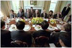 Vice President Dick Cheney hosts a state lunch at the Naval Observatory for Chinese Vice President Hu Jintao May 1, 2002. Photographed with the Vice President, from left to right, are National Security Advisor Dr. Condoleezza Rice, Secretary of Commerce Donald Evans, Secretary of State Colin Powell, Secretary of the Treasury Paul O'Neill, Secretary of Labor Elaine Chao and Deputy Secretary of Defense Paul Wolfowitz. 