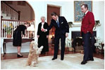 Then-President Ronald Reagan and Nancy Reagan spend an evening with then-Vice President George H.W. Bush, Barbara Bush and their dog C. Fred at the Naval Observatory Feb 12, 1981.