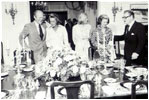 Then-Vice President Nelson Rockefeller (right) and his wife Margaretta Murphy (second on right) entertain then-President Gerald R. Ford (left) his wife Betty (second on left) and their daughter Susan (center) at the Naval Observatory on September 7, 1975. 