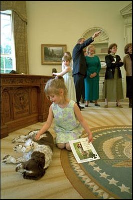 Spot makes a new friend in the Oval Office, April 3, 2002.