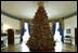 The Blue Room has long been the location of the official White House Christmas Tree. Ed and Cindy Hedlund and their son Thomas, of Hedlund Christmas Farm in Elma, Washington, presented this year's 18-foot noble fir to President George W. Bush and wife Laura Bush.