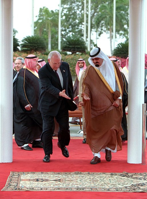 Vice President Dick Cheney and Crown Prince Abdullah of Saudi Arabia extend courtesies to each other as they enter the area where the two leaders will stand during an arrival ceremony in Jeddah, Saudi Arabia, March 16. White House photo by David Bohrer.
