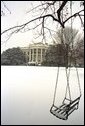 A blanket of snow covers the South Lawn of the White House, Thursday, Dec. 5, 2002. White House photo by Moreen Ishikawa.