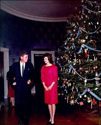First Lady Jacqueline Kennedy introduced the tradition of Christmas Tree themes in 1961 with a "Nutcracker Suite" theme featuring trimmings derived from the ballet by Tchaikovsky. Ornaments included gingerbread cookies, tiny toys, wrapped packages, candy canes and straw ornaments made by disabled or senior citizen craftsmen throughout the United States.
