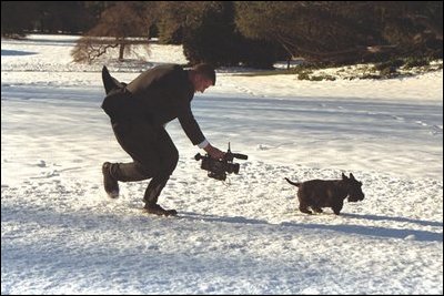 Whether inside the White House or outside on the South Lawn, keeping up with the spirited Scottish Terrier was a challenge for the camera crew of the Barney Cam. 