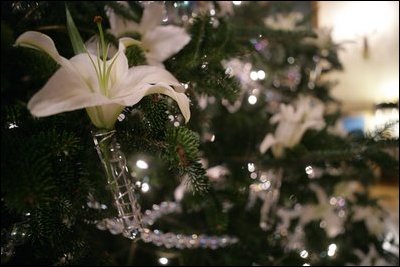 A lily flower decoration is seen on the White House Christmas Tree, a large Fraser Fir, in the Blue Room of the White House, Wednesday, Nov. 30, 2005. 