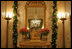 Boxwood Garland and tulips frame the Cross Hall mirrors for the 2005 Holiday season.