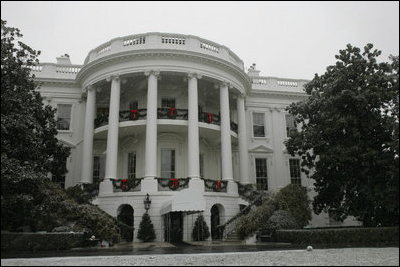 A thin blanket of snow wraps the White House for the Holiday season Monday, Dec. 5, 2005.