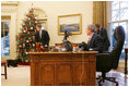 President George W. Bush calls Barney to the Oval Office, Friday, Dec. 1, 2006, to tape their segment for this year's Barney Cam video.