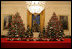 The White House has a total of 17 decorated Christmas trees. Two are placed next to the famous portraits of George and Martha Washington in the East Room. They are trimmed with silvered-glass ornaments painted in red and fuchsia. Between them, recessed in the wall is an elaborate nativity scene.
