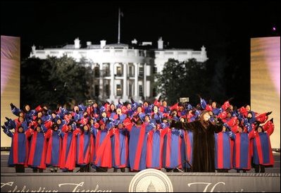 The Eastern High School Choir joins singer Yolanda Adams during a performance at the 'Celebration of Freedom' concert on the Ellipse south of the White House, Wednesday, Jan. 19, 2005.