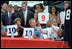 President Bush and Mayor Street help judge a contest at an urban block party in Philadelphia's downtown July 4, 2001.