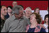 President George W. Bush embraces Joy Enders, president of the 167th Airlift Wing Family Readiness Group, Wednesday, July 4, 2007, during a Fourth of July visit with members of the West Virginia Air National Guard 167th Airlift Wing and their family members in Martinsburg, W. Va. President Bush thanked Enders and members of her organization for their mission to care for the families of deployed Guard members. White House photo by Chris Greenberg