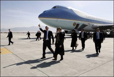 President George W. Bush gives the thumbs-up after Air Force One landed at Bagram Air Base near Kabul, Afghanistan Wednesday, March 1, 2006. The five-hour surprise visit included a meeting with Afghan President Karzai, a ceremonial ribbon-cutting at the U.S. Embassy, and a visit to the troops at Bagram.