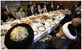 President George W. Bush and President Hamid Karzai of Afghanistan share a working lunch Wednesday, March 1, 2006, at the Presidential Palace in Kabul during a stop by President Bush en route to India.