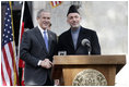 President George W. Bush and President Hamid Karzai of Afghanistan appear together Wednesday, March 1, 2006 at a joint news conference at the Presidential Palace in Kabul, Afganistan.