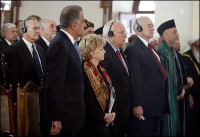 Vice President Dick Cheney and his wife, Lynne, attend the swearing-in ceremony for Afghanistan President Hamid Karzai at Salaam Khana in Kabul, Afghanistan, Dec. 7, 2004. President Karzai is Afghanistan.s first democratically-elected president in Afghanistan's history. Also pictured, from left back, Secretary of Defense Donald Rumsfeld, Afghanistan Vice President Hedayat Amin Arsala, left front; U.S. Ambassador to Afghanistan Zalmay Khalilzad, and Afghanistan President Hamid Karzai, right.