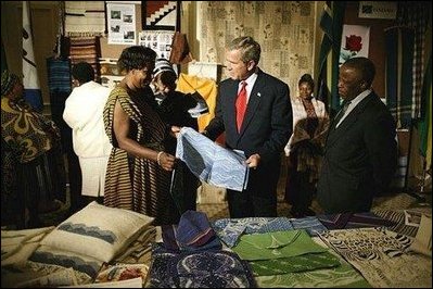 President George W. Bush participates in a tour of the Southern Africa Global Competitiveness Hub with President Festus Gontebanye Mogae of Botswana Thursday, July 10, 2003. White House photo by Paul Morse