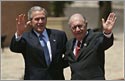 President George W. Bush waves with Chilean President Ricardo Lagos.
