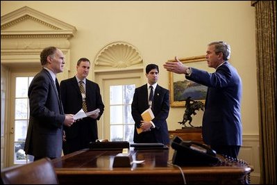 President George W. Bush meets with members of his National Economic Council in the Oval Office Feb. 10, 2004. From left, they are Director Stephen Friedman, Brain Reardon and Kevin Warsh. 