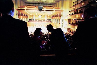President George W. Bush and Laura Bush enjoy a December 2003 performance of the Iraqi National Symphony Orchestra at the Kennedy Center, Washington, D.C. 