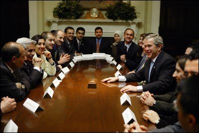 President George W. Bush meets with Iraqi Fulbright Scholars in the Roosevelt Room, Feb. 3, 2004.