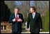 President Bush and Prime Minister Tony Blair of Great Britain walk on the grounds at Hillsborough Castle. Hillsborough, Northern Ireland, April 8, 2003.