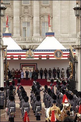 President George W. Bush and Laura Bush listen to the playing of America's national anthem during an official welcome ceremony at Buckingham Palace in London, Wednesday, Nov. 19, 2003. Standing with them are Her Majesty Queen Elizabeth and Prince Philip, Duke of Edinburgh. The President and Mrs. Bush last visited Buckingham Palace July of 2001. White House photo by Eric Draper