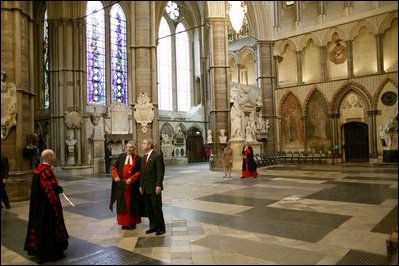 Walking with Dr. Wesley Carr, President George W. Bush tours Westminster Abbey Thursday, Nov. 20, 2003. Mrs. Bush is also pictured. White House photo by Eric Draper