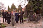 Laura Bush and her staff tour the historic cemetery of the Church of Saints Peter and Paul. The cemetery is known as the burial site of many prominent Czechs, such as the composer Dvorak, as well as the site for a notable collection of sculptural art. White House photo by Susan Sterner.