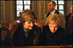 Laura Bush looks over the historic book collection housed at Vilnius University with Alma Adamkiene, wife of the President of Lithuania, Saturday, Nov. 23, 2002. White House photo by Susan Sterner.
